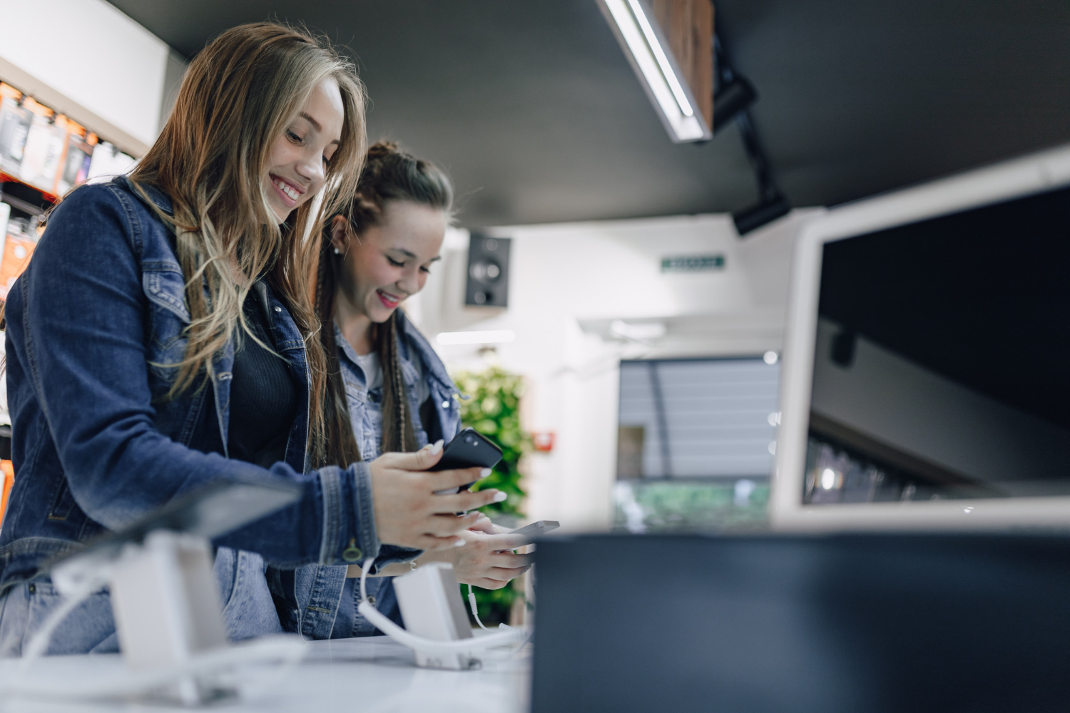 Teens in store browsing technology