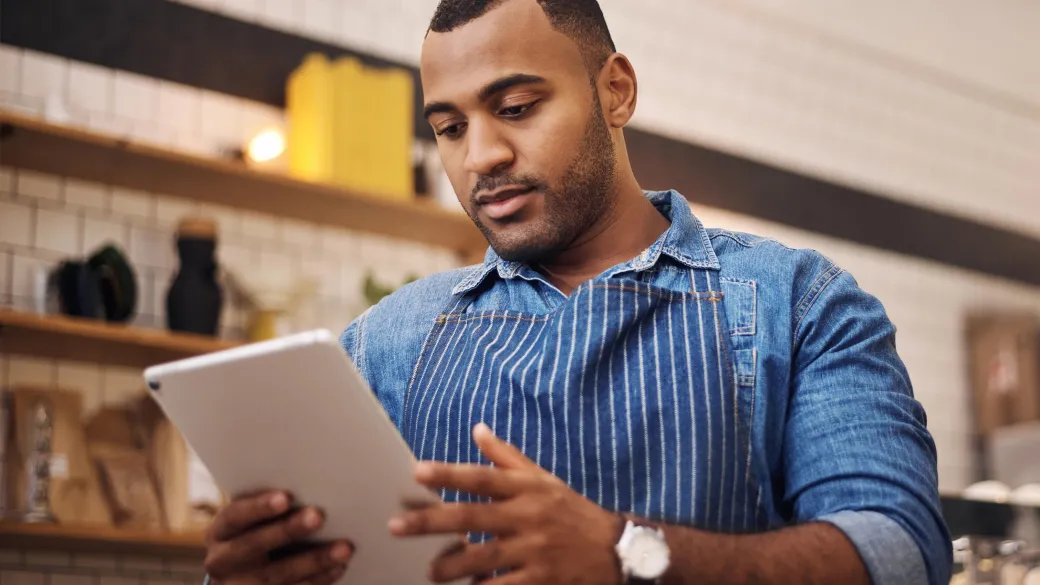 Cafe manager with tablet