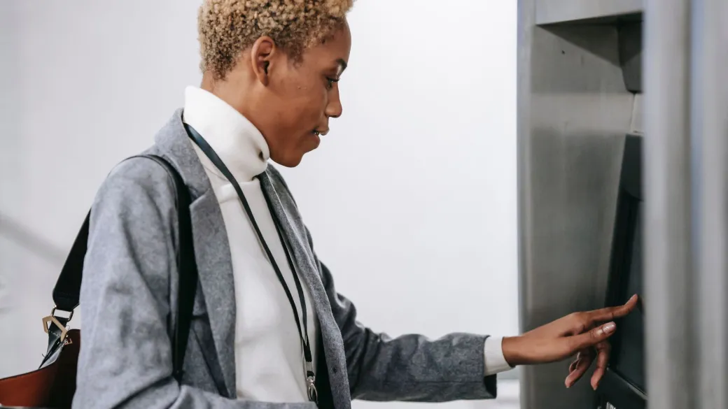 people vending ticketing woman buys ticket