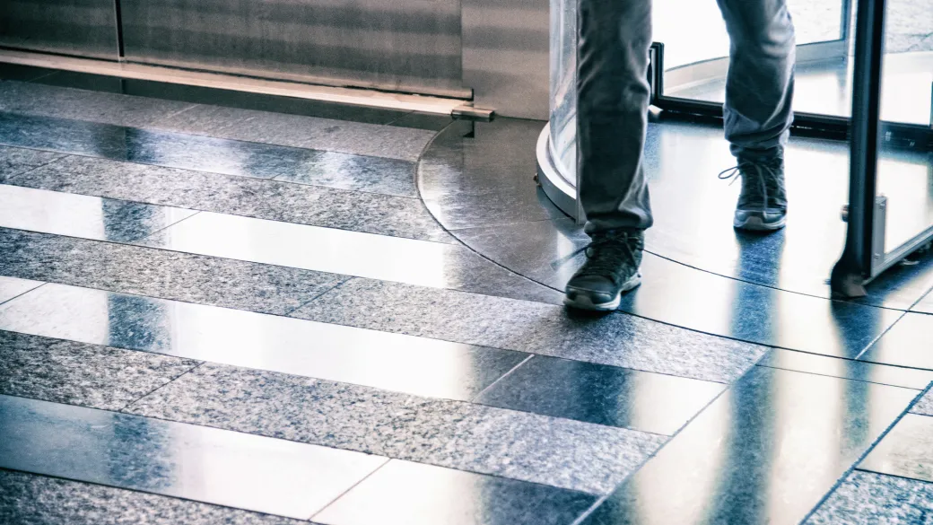 man walking into a bank