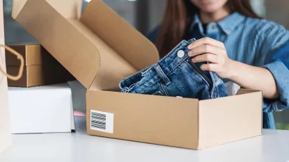 Retail woman opening postal parcel box