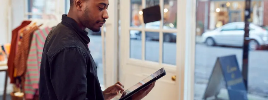 people support man on tablet