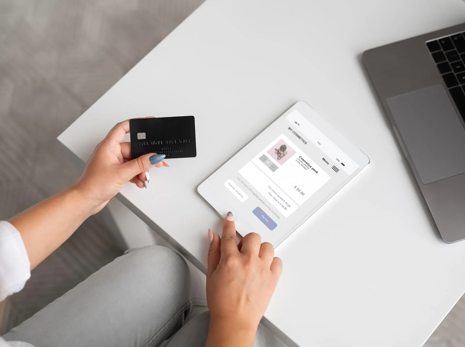 Woman finalizing online payment hosted checkout