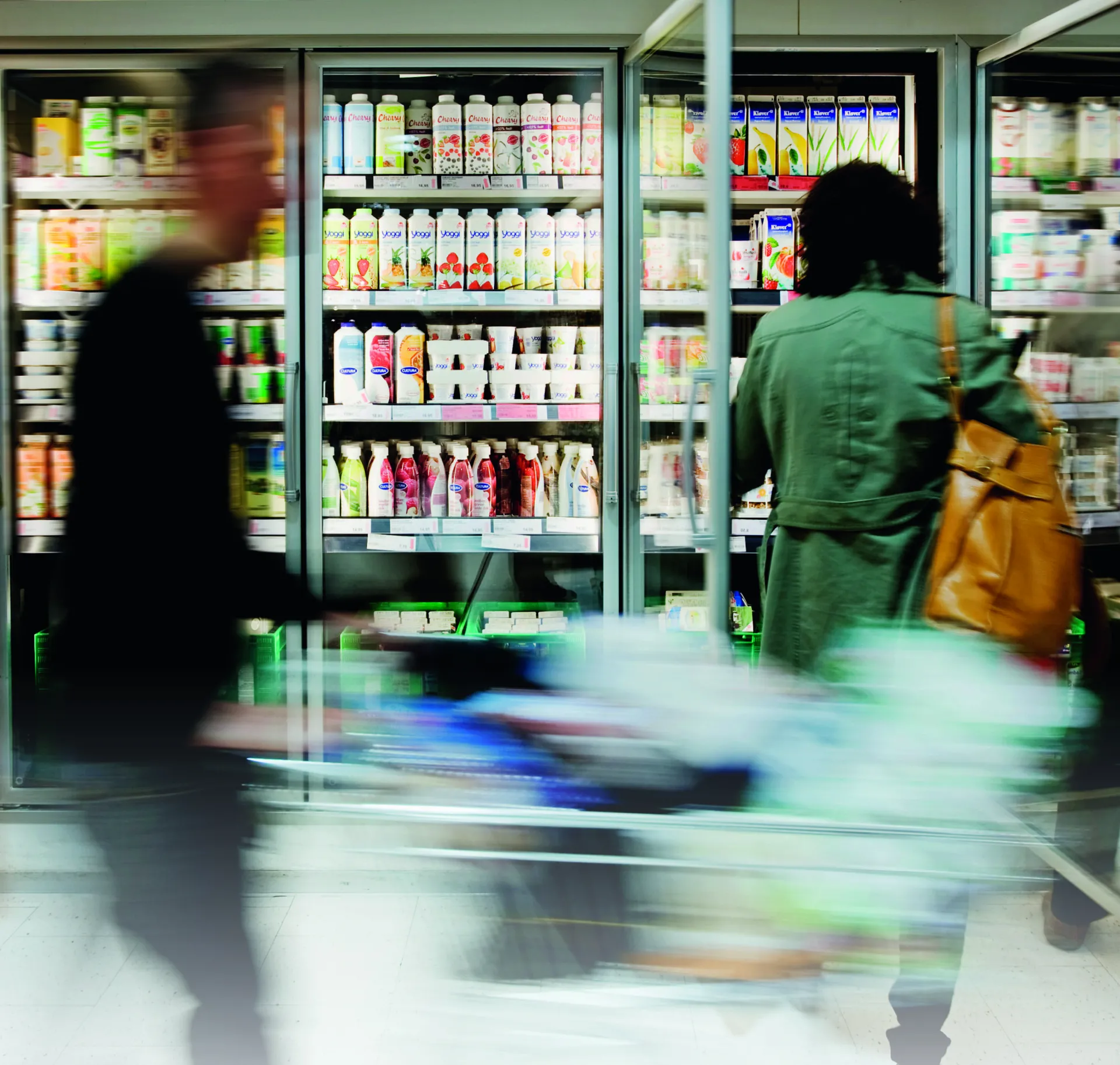 grocery store with man pushing trolly