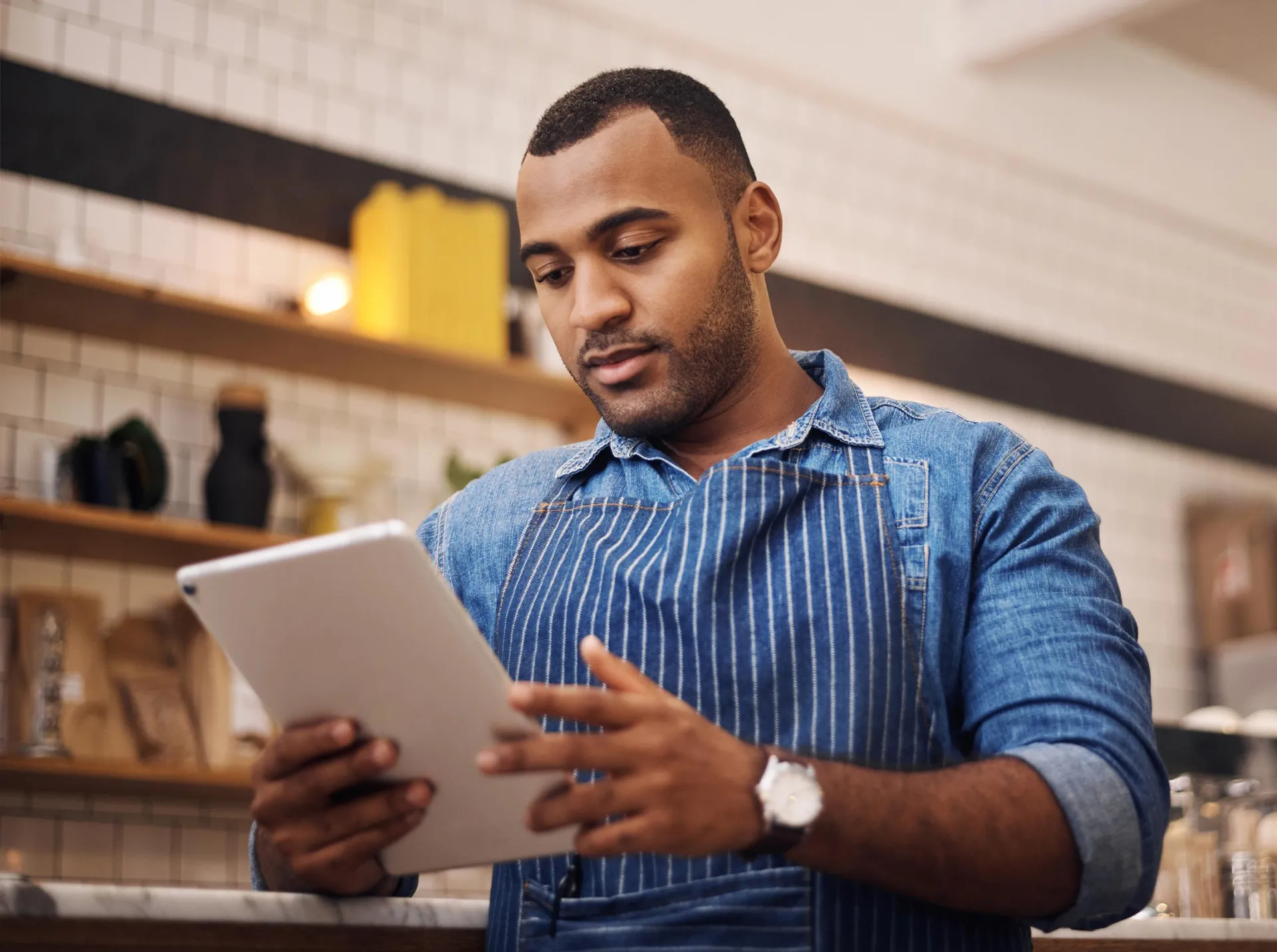 Cafe manager with tablet