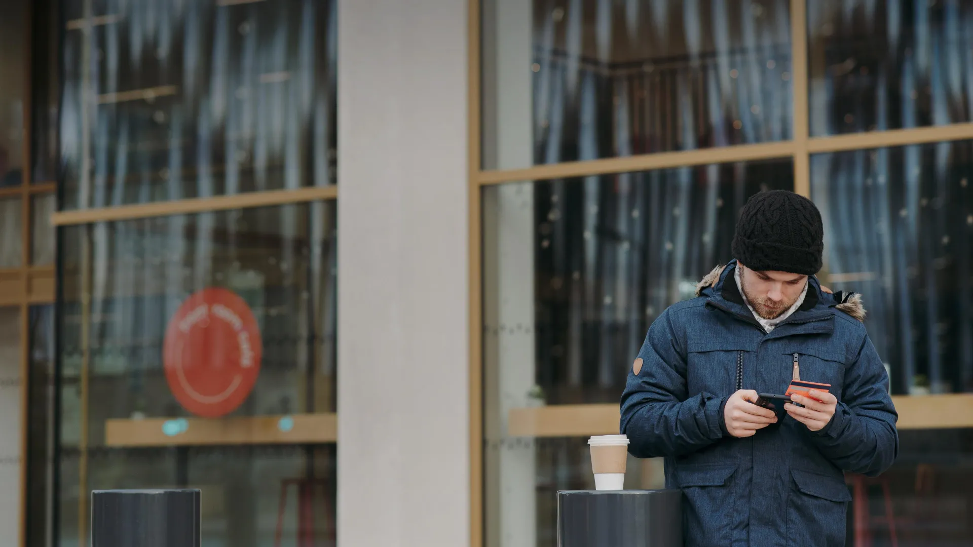 Man making online payment street