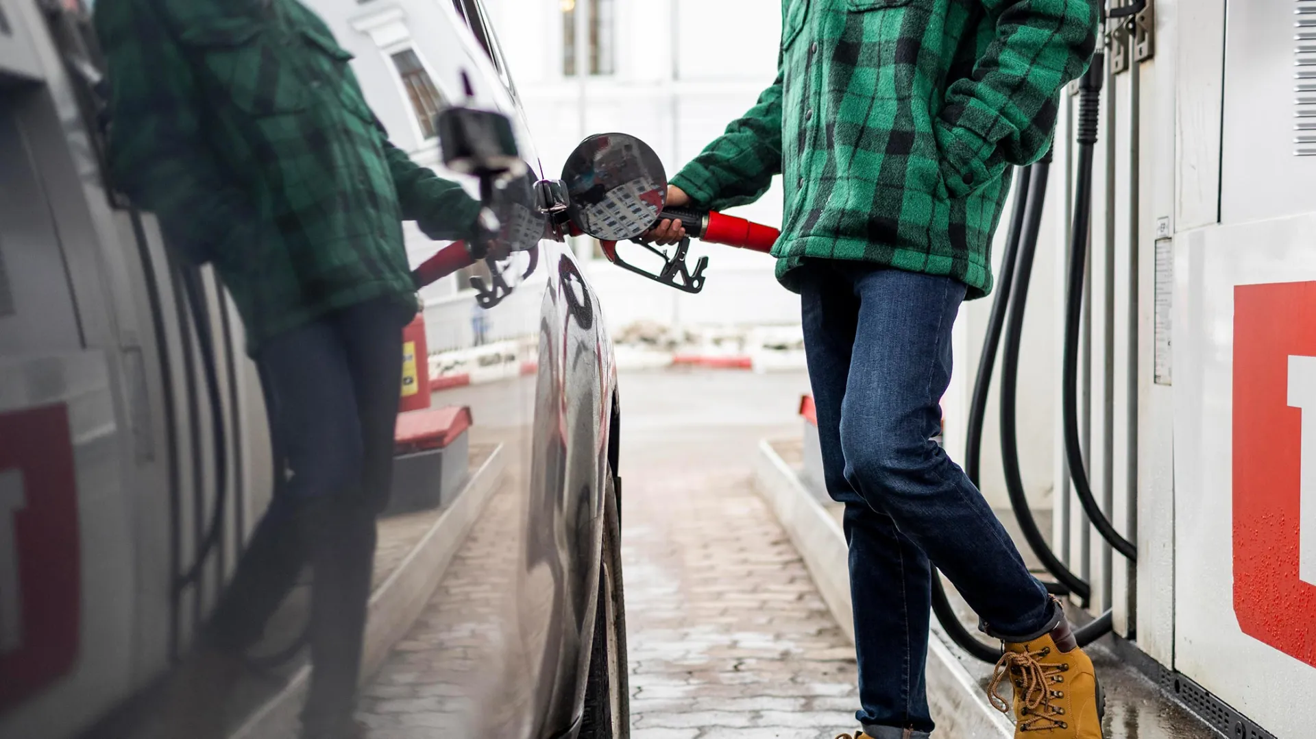 Close up man with car gas station