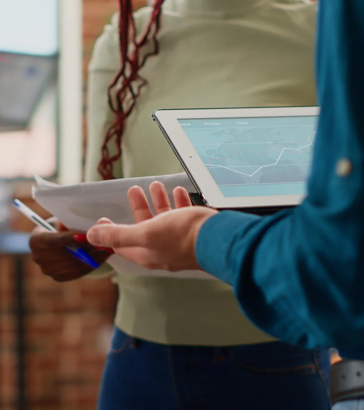 Colleagues analyzing subscription data