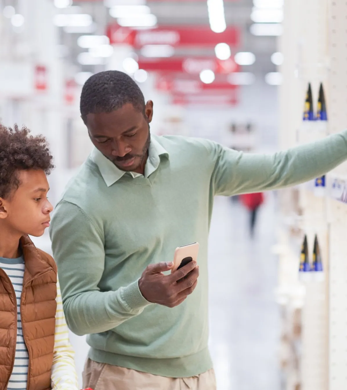 father and son in home improvement store