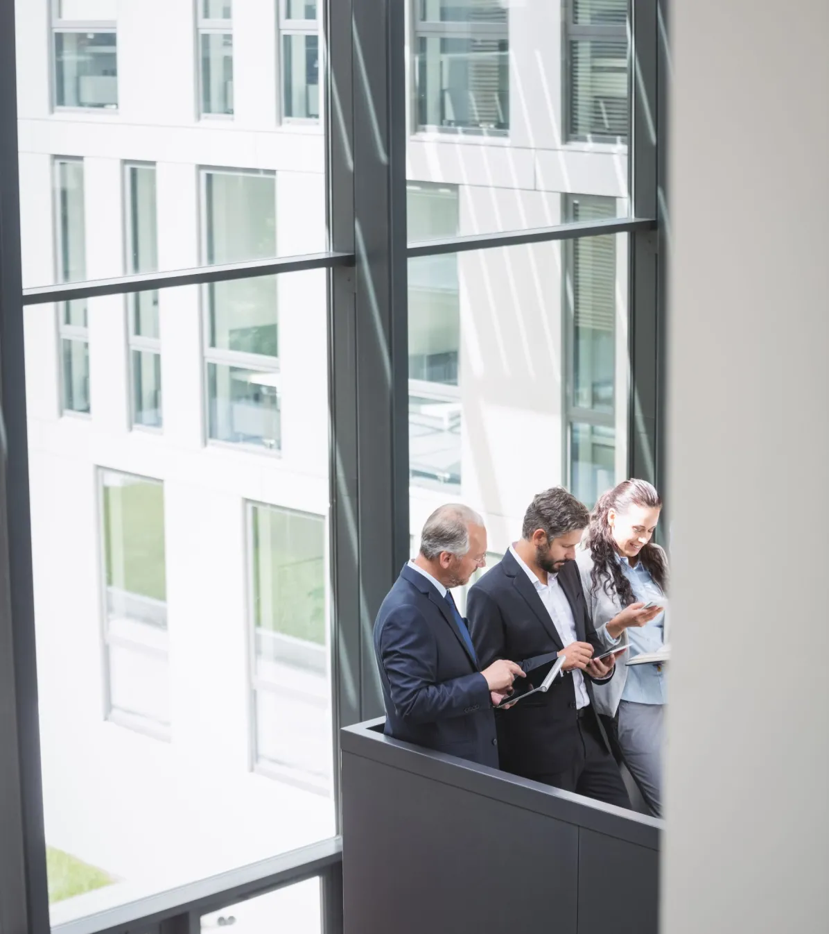 people acquiring partners businesspeople using mobile phone digital tablet