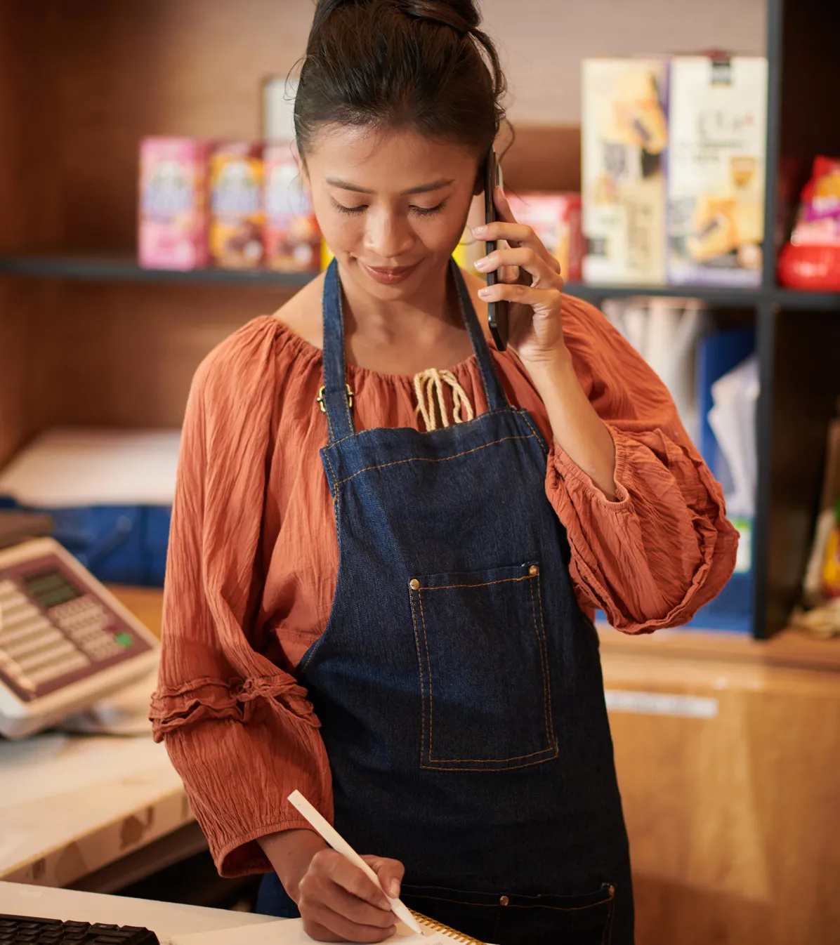 Store worker talking phone