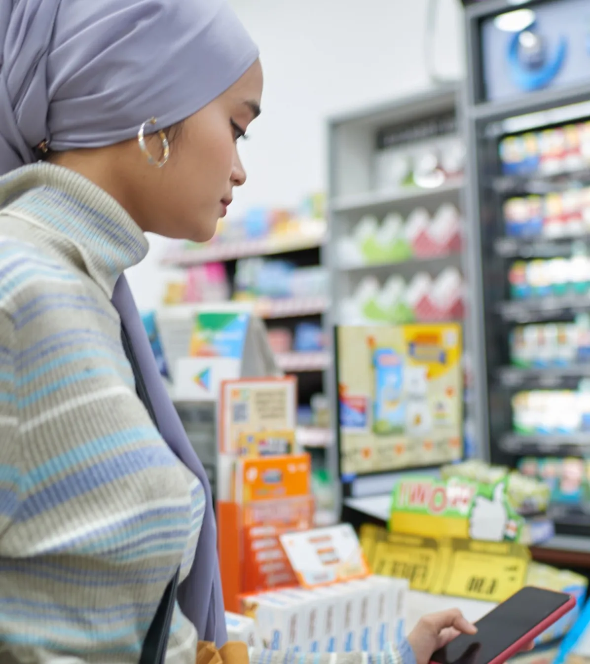 woman at convenience store counter