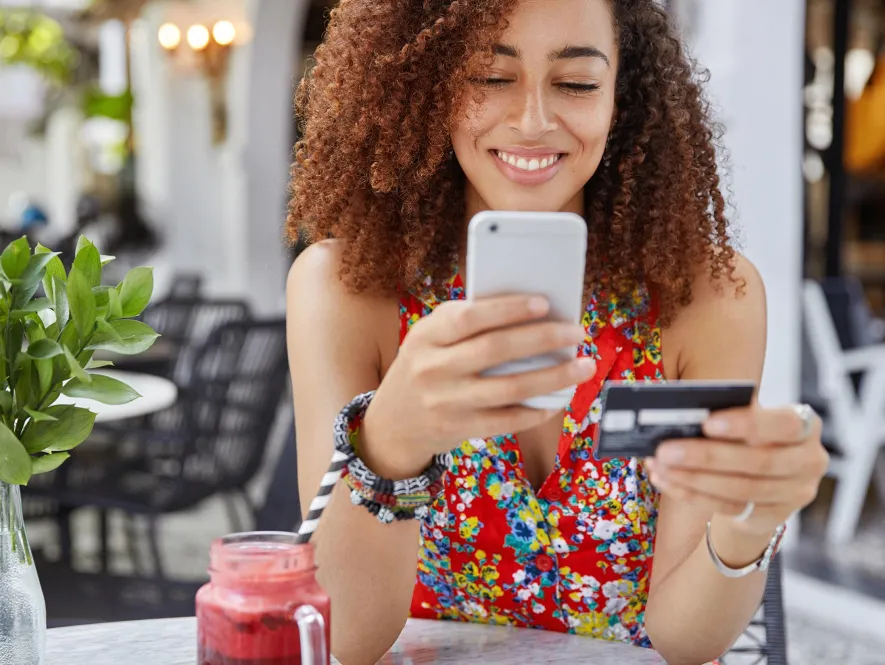 Unified payments woman online payment at terrace