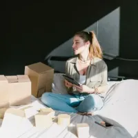 people redirect checkout woman unboxing packages