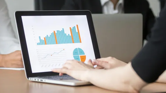 Transaction chart growth on laptop screen