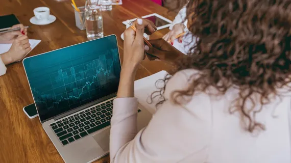 Business woman analyzing charts