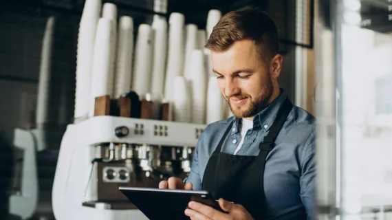 detail tokenization young man barista coffee shop