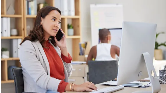 people cloud services corporate woman phone call computer typing working