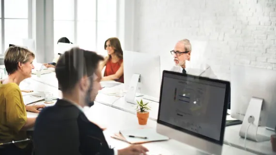 people reporting and analytics people at desks