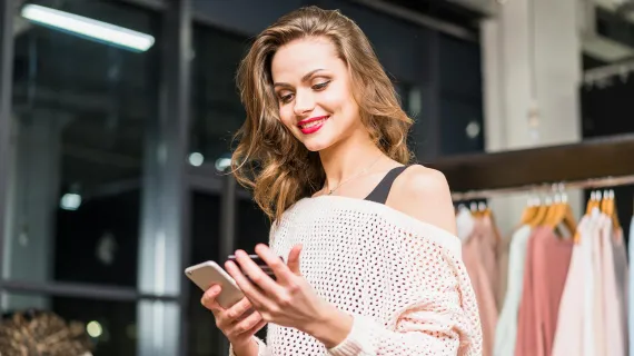 Beautiful making woman online payment in-store